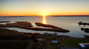 Aerial View of Sunset on Back Bay Courtesy of Revolution 6 Media